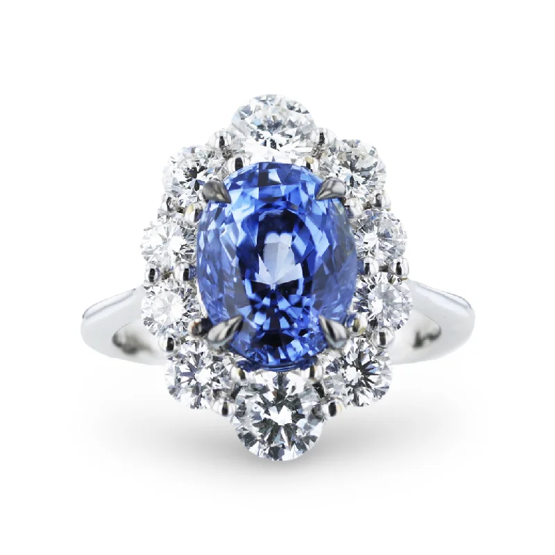 JULEVE 18KT WHITE GOLD 4.06CT SAPPHIRE & 1.60CTW DIAMOND HALO RING